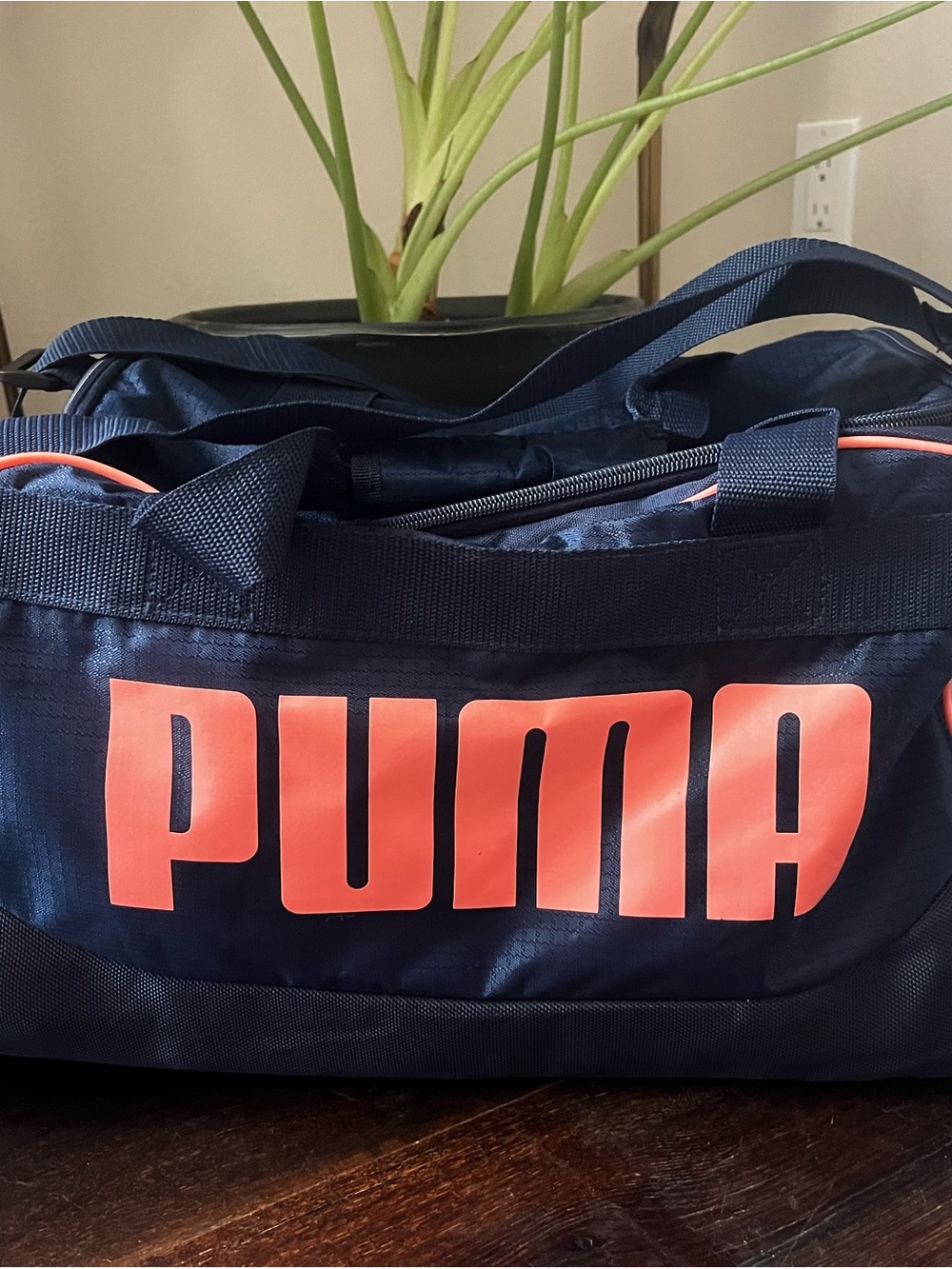 Puma Navy Duffel Bag with Coral Logo Accents